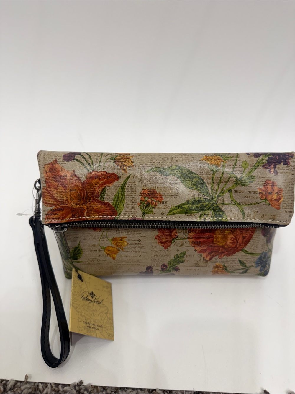 Patricia Nash Valerie leather fold over wristlet clutch Parisian newspaper NWT